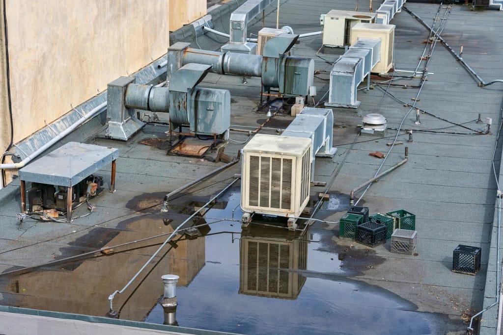 commercial roof water pooling